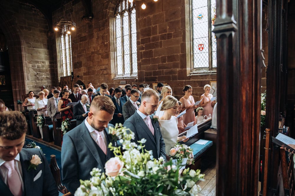 bride and groom getting married in a cheshire church