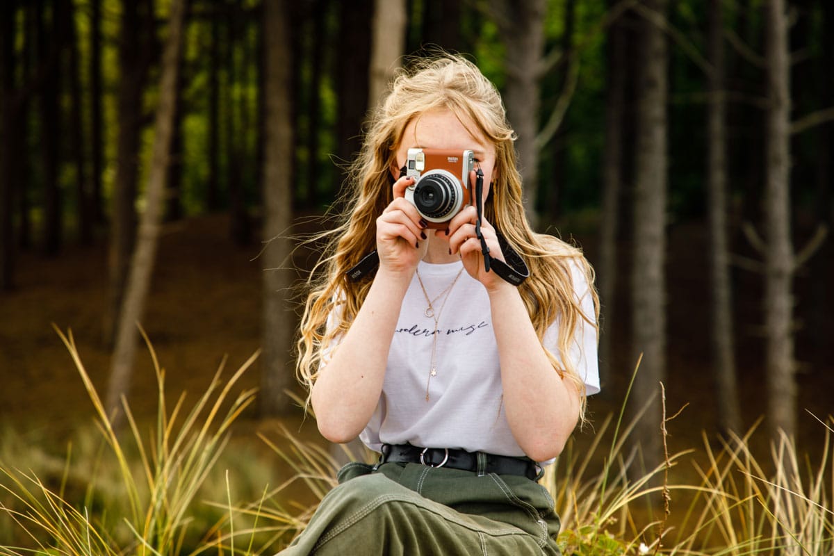 camera out on a beach photoshoot