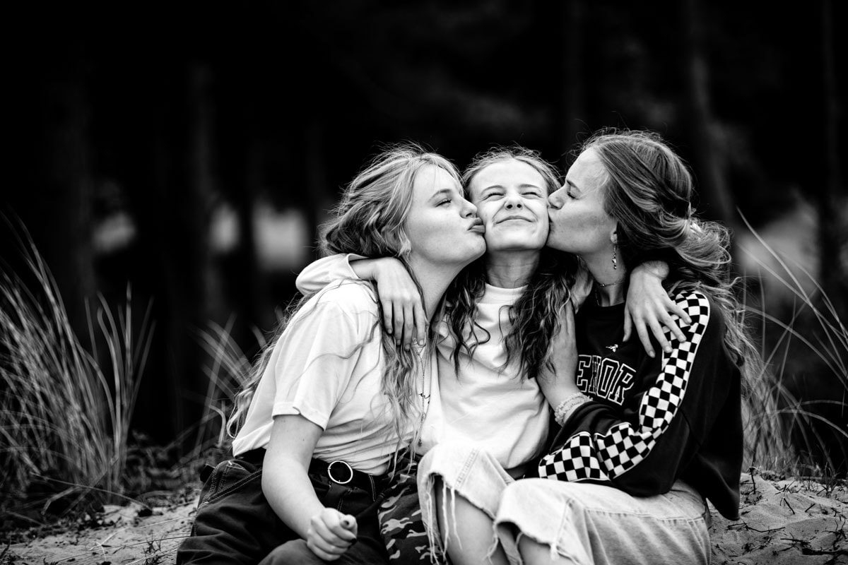 cuddles on a photoshoot at formby beach