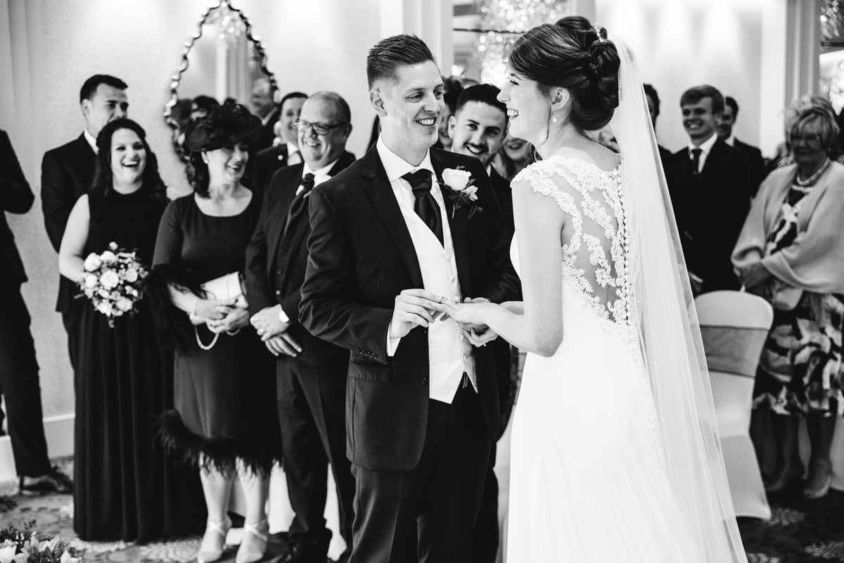 exchanging rings at the thornton hall hotel