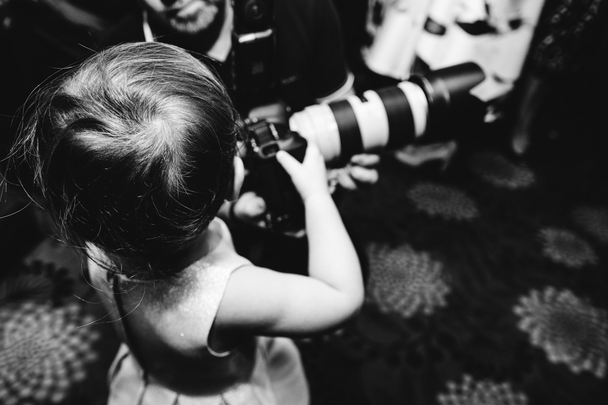 wedding guest with a camera