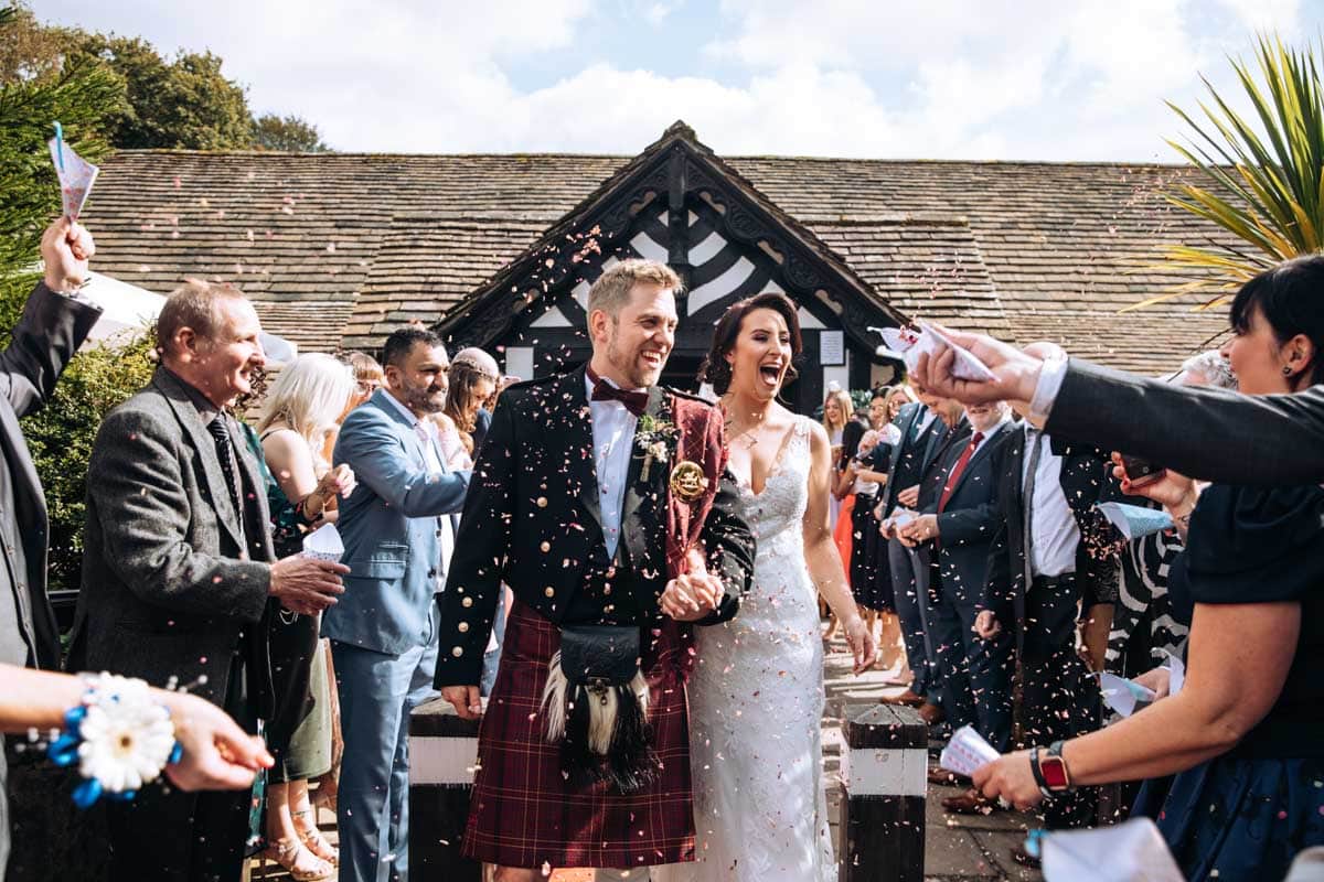 Rivington Barn Wedding Confetti Bride and Groom