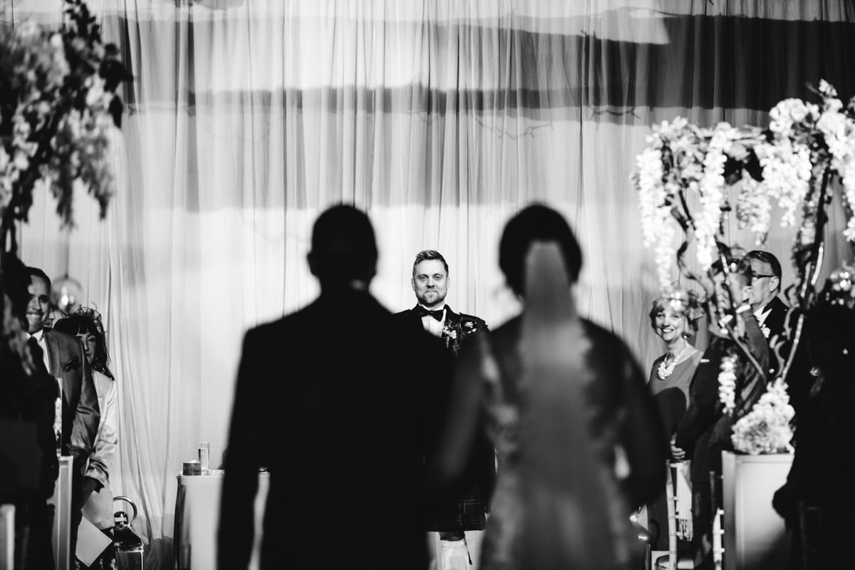 grooms first look at his bride