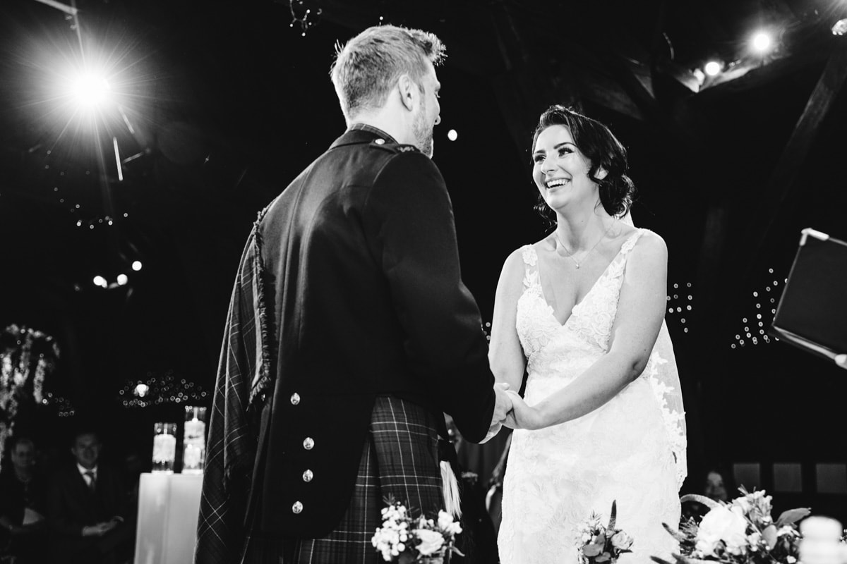 bride is very happy at rivington barn
