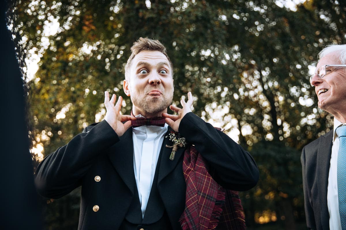 groom having fun at rivington barn