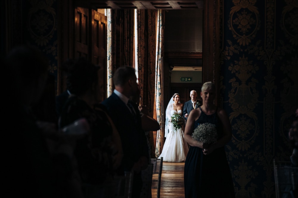 bride walking down the aisle at soughton hall