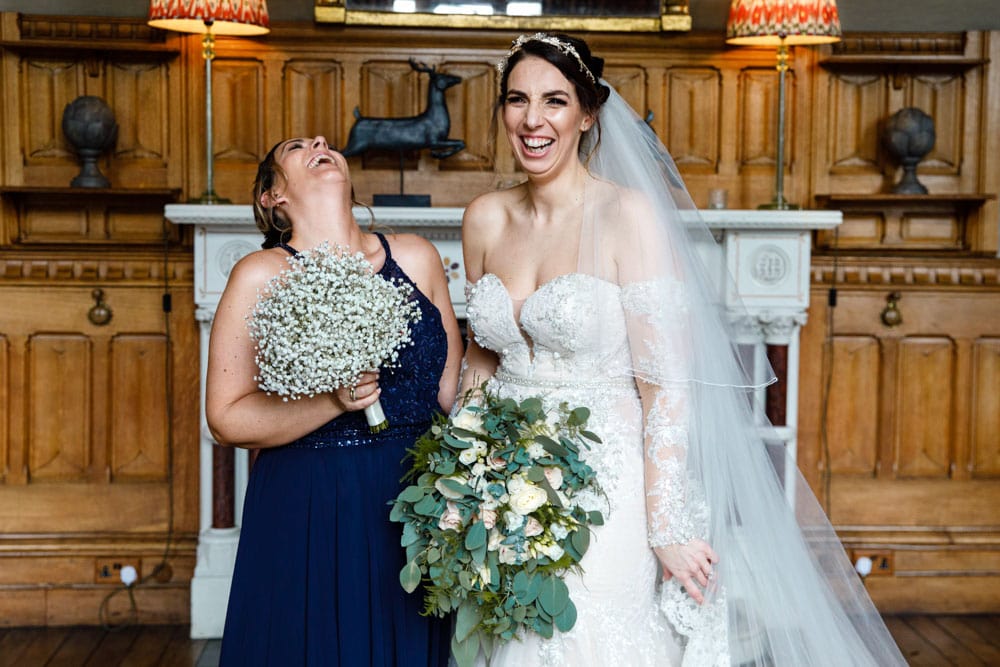 having fun inside soughton hall at a wedding