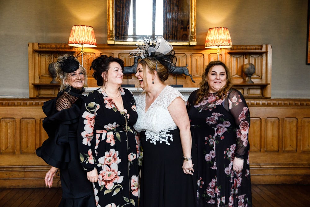 wedding guests having photos