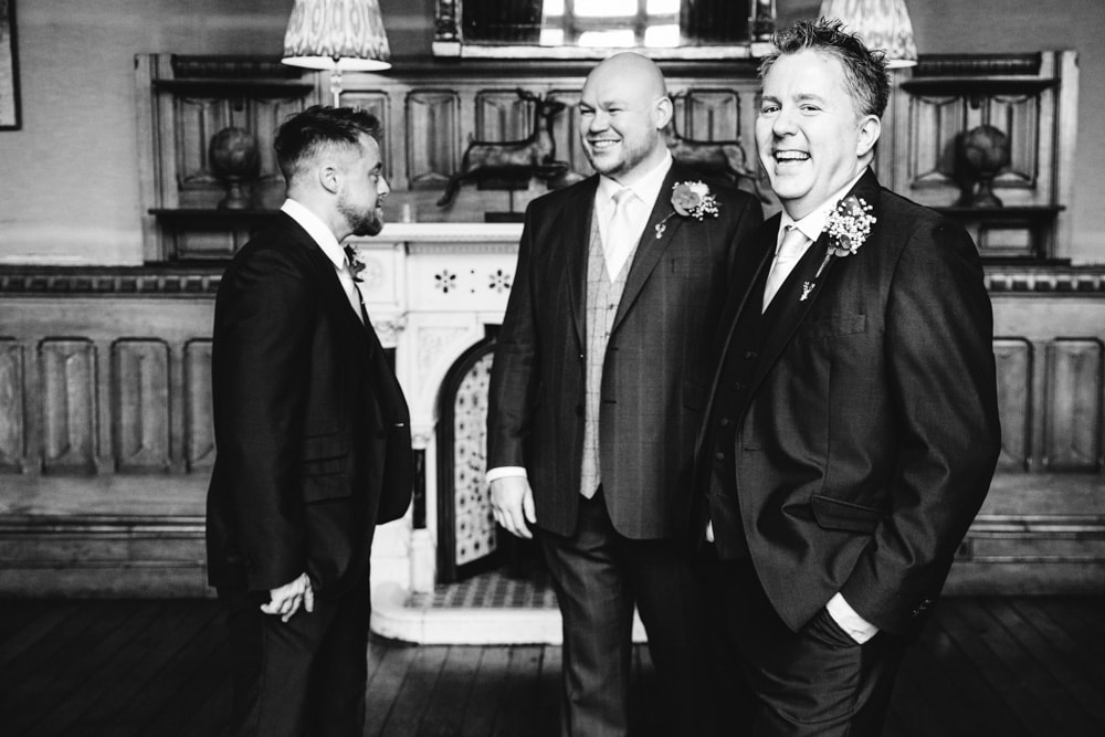 groomsmen having photos
