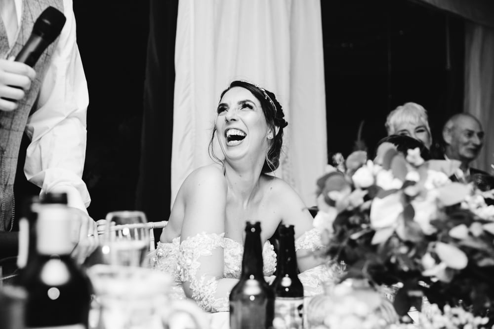 bride laughing at soughton hall