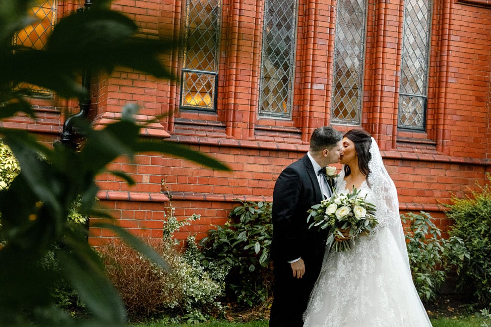 bride and groom portraits at st vincent church altrincham