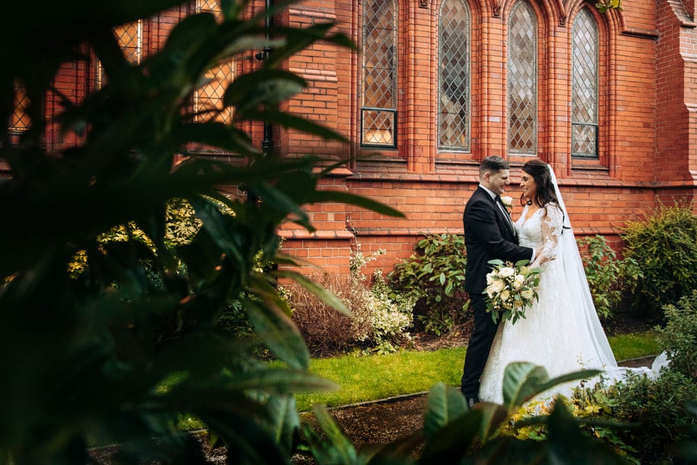 bride and groom portraits at st vincent church altrincham