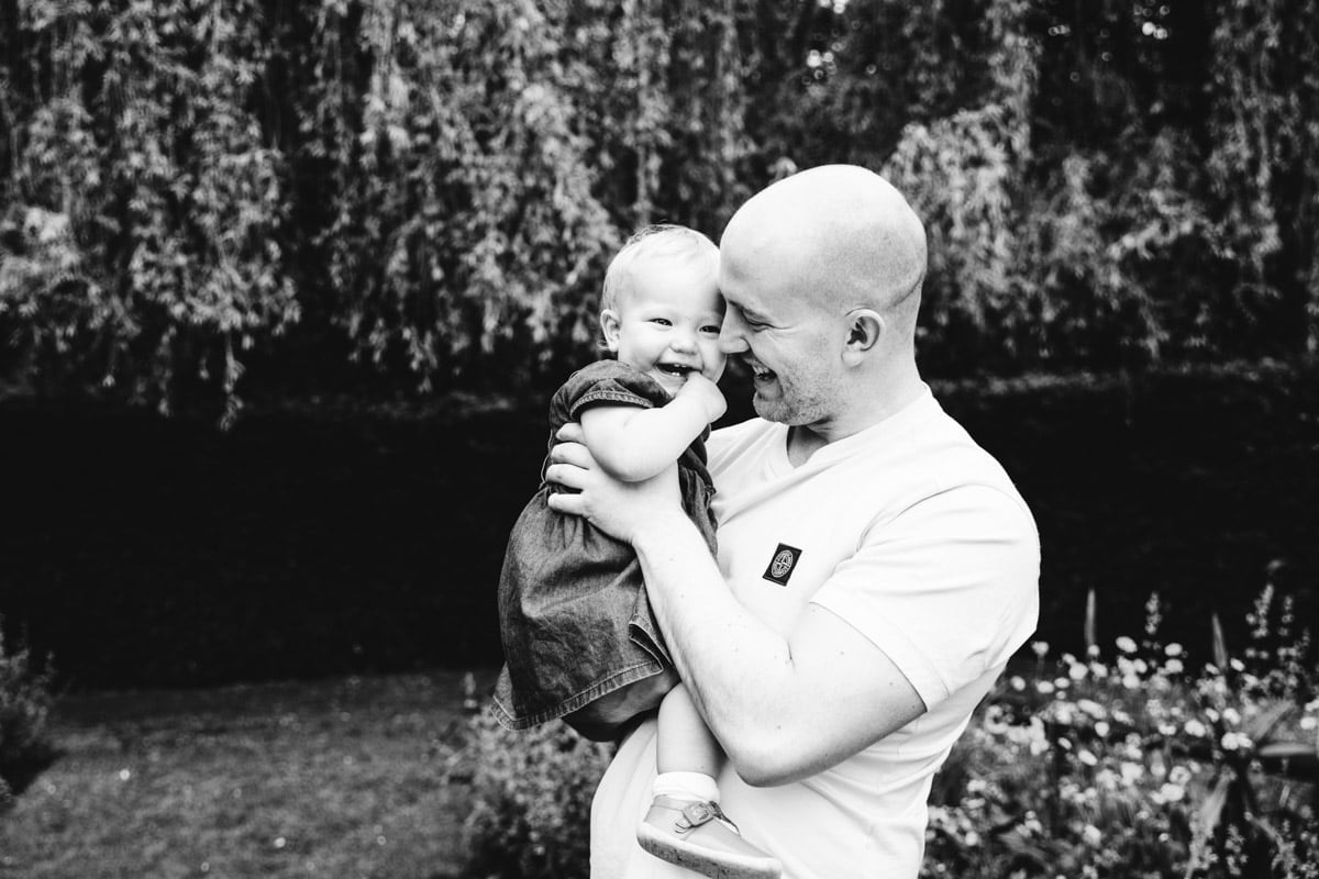 Dad and daughter laughing