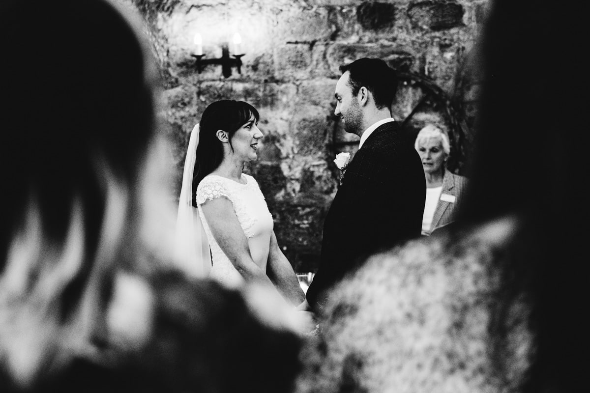 bride and groom during the ceremony at danby castle