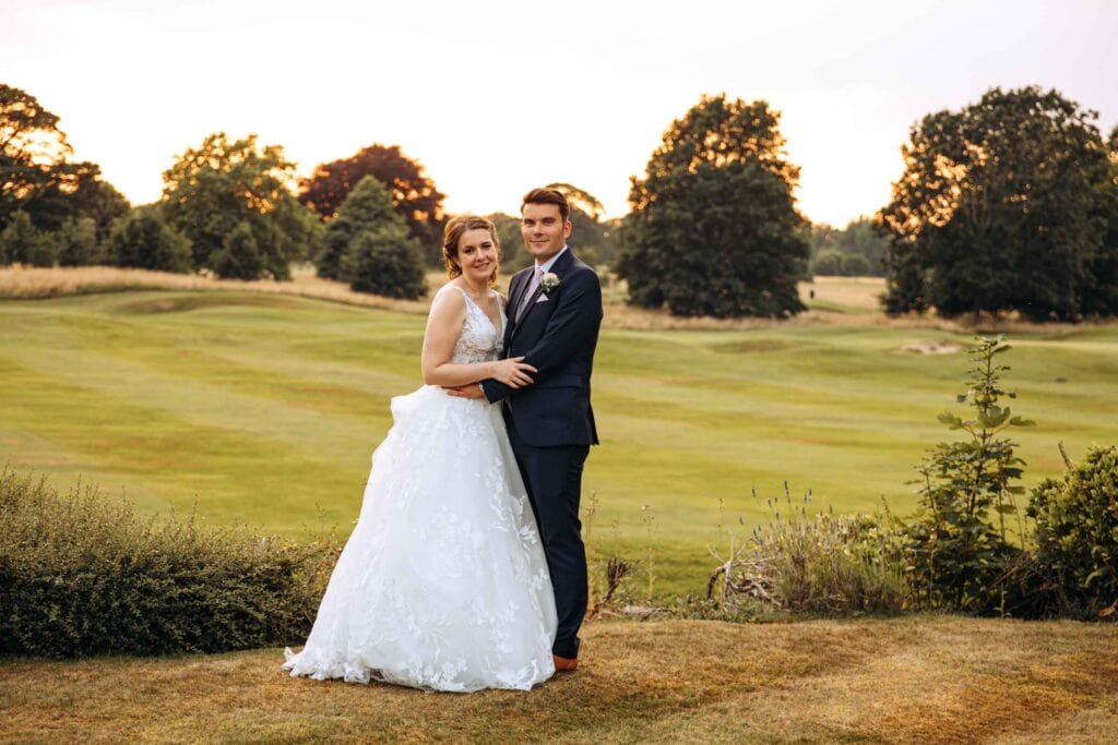 Mottram Hall Wedding Photographer Bride and Groom at sunset at Mottram Hall