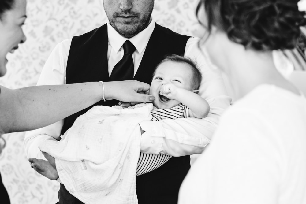 baby giggles during bridal prep