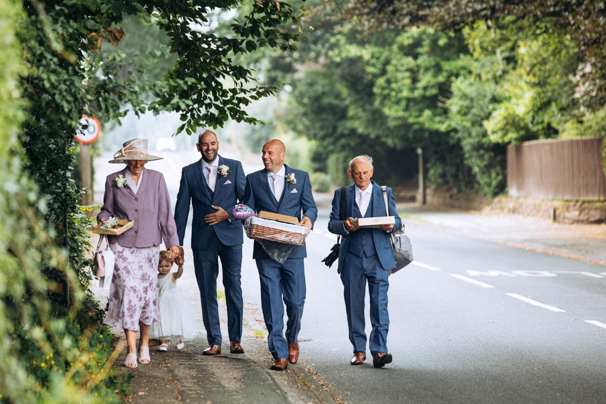 groom walking to the church