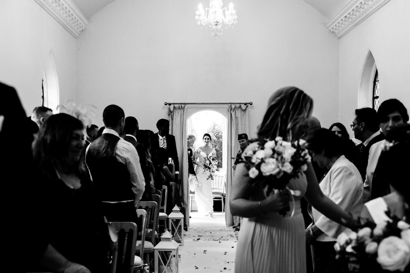 brides arrival in the chapel at eshott hall