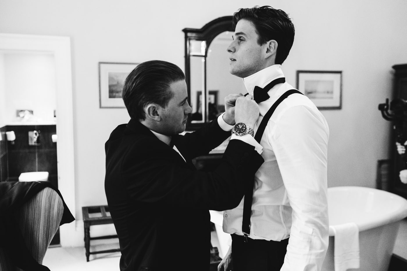 groom getting ready during his wedding photography at eshott hall