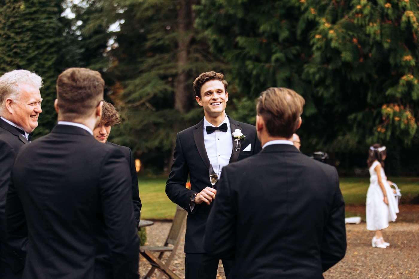 confetti outside the chapel at eshott hall wedding photography