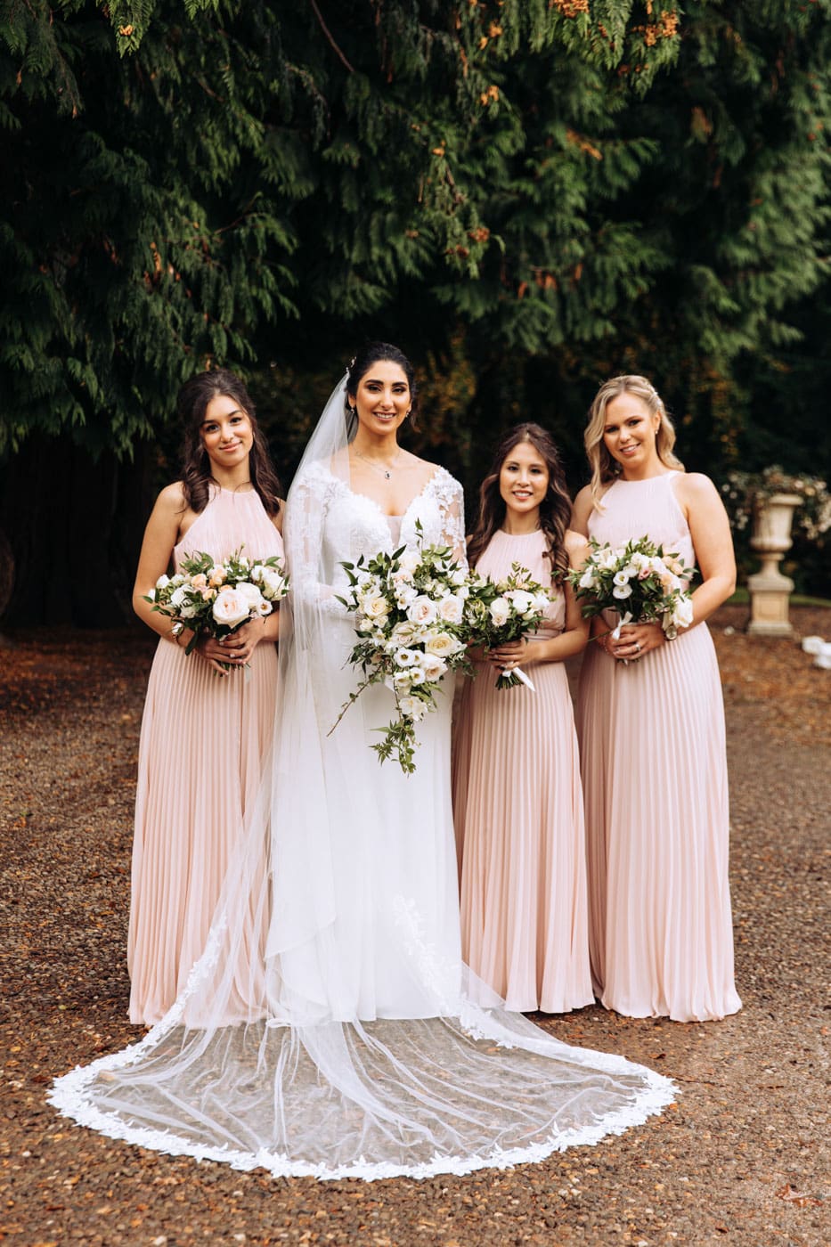 bridal party group photographs at eshott hall during their wedding day photography