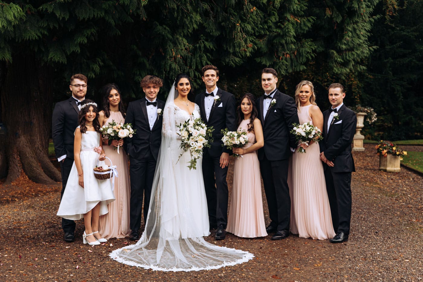 bridal party group photographs at eshott hall during their wedding day photography