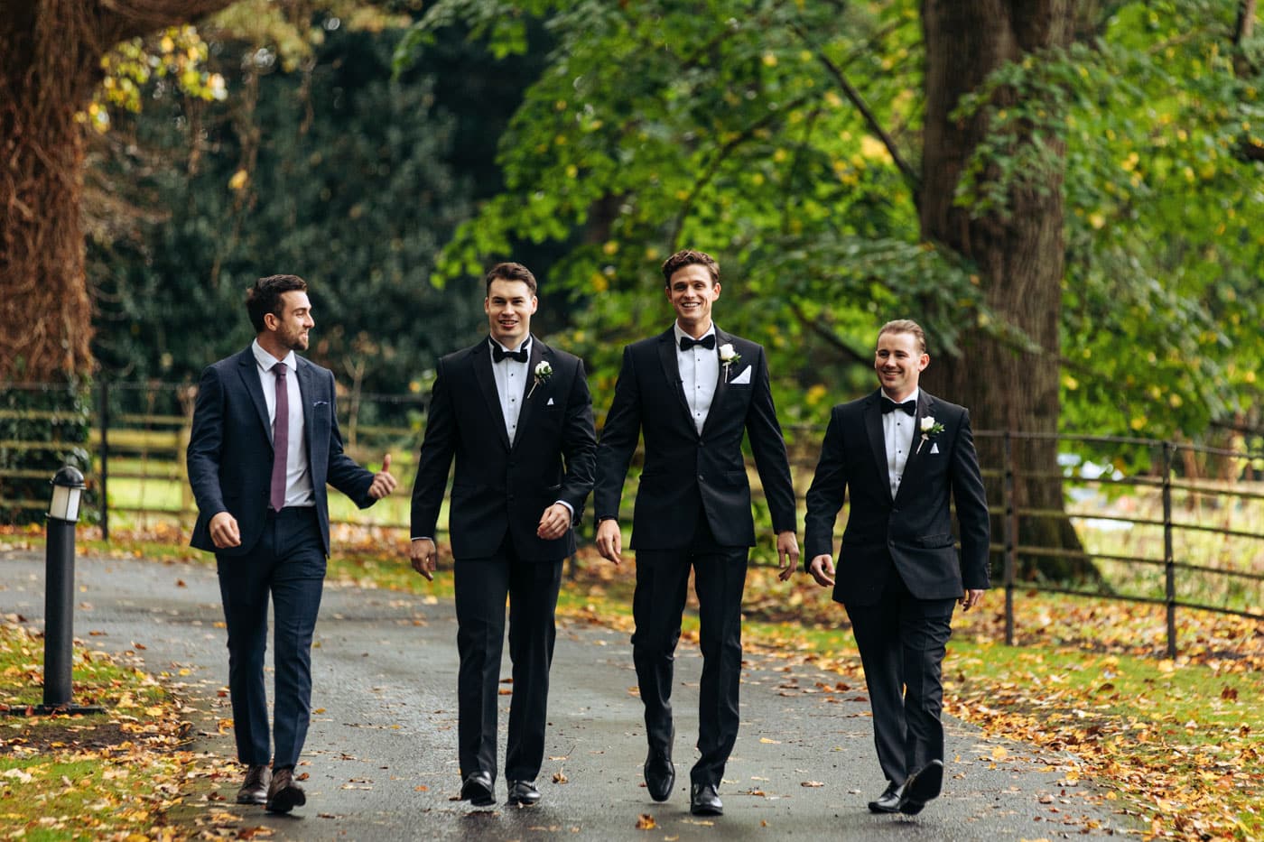 groom walking to the chapel at eshott hall wedding photography