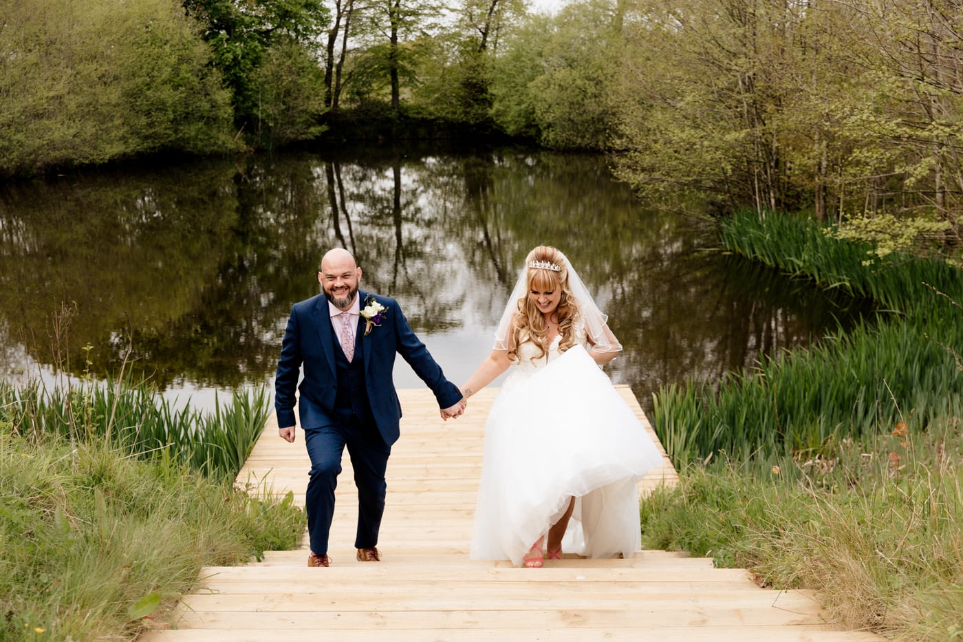 styal lodge portraits with a bride and groom at the lake