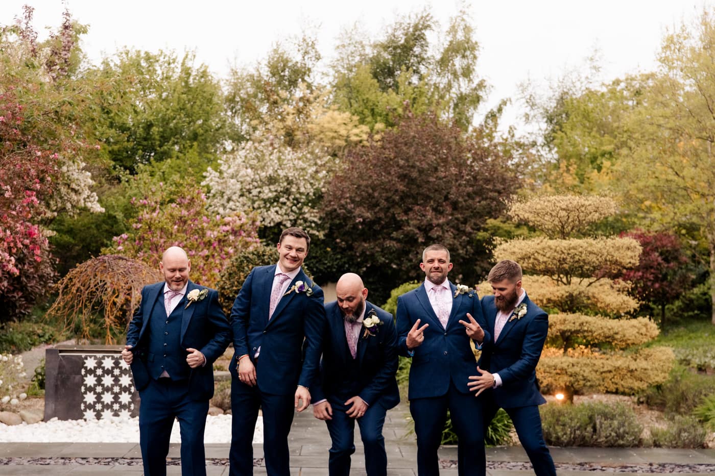 group photos in the gardens at styal lodge wedding barn in cheshire