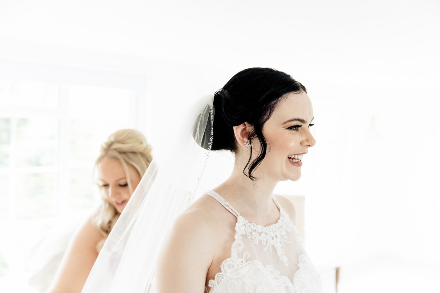bride getting ready at the hilltop country house hotel in macclesfield