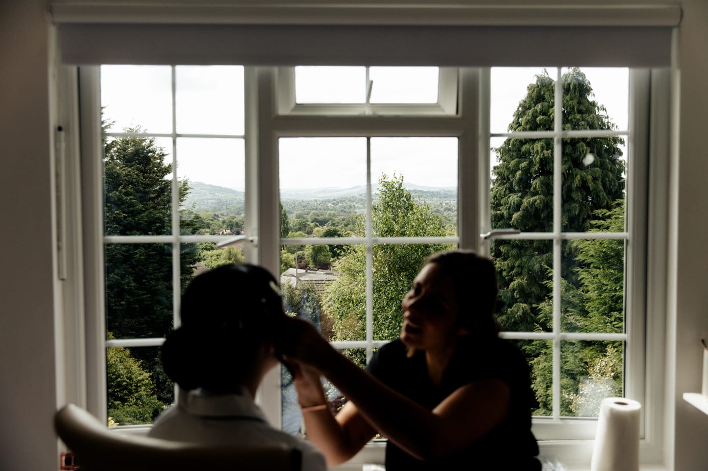 bride getting ready at the hilltop country house hotel in macclesfield