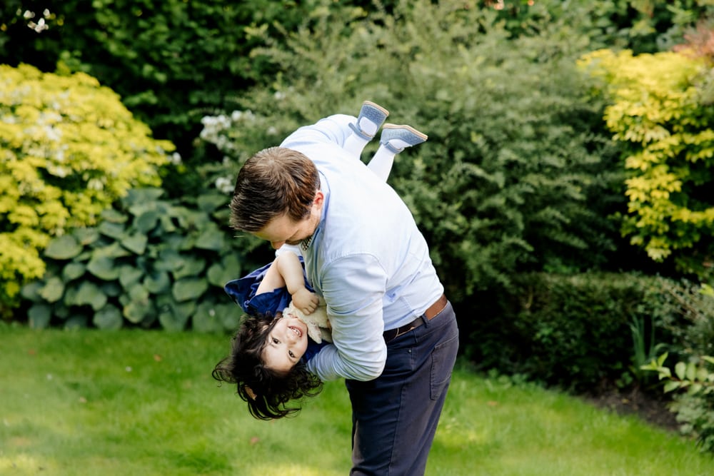 Family photography session in bowden in the back garden of a family home