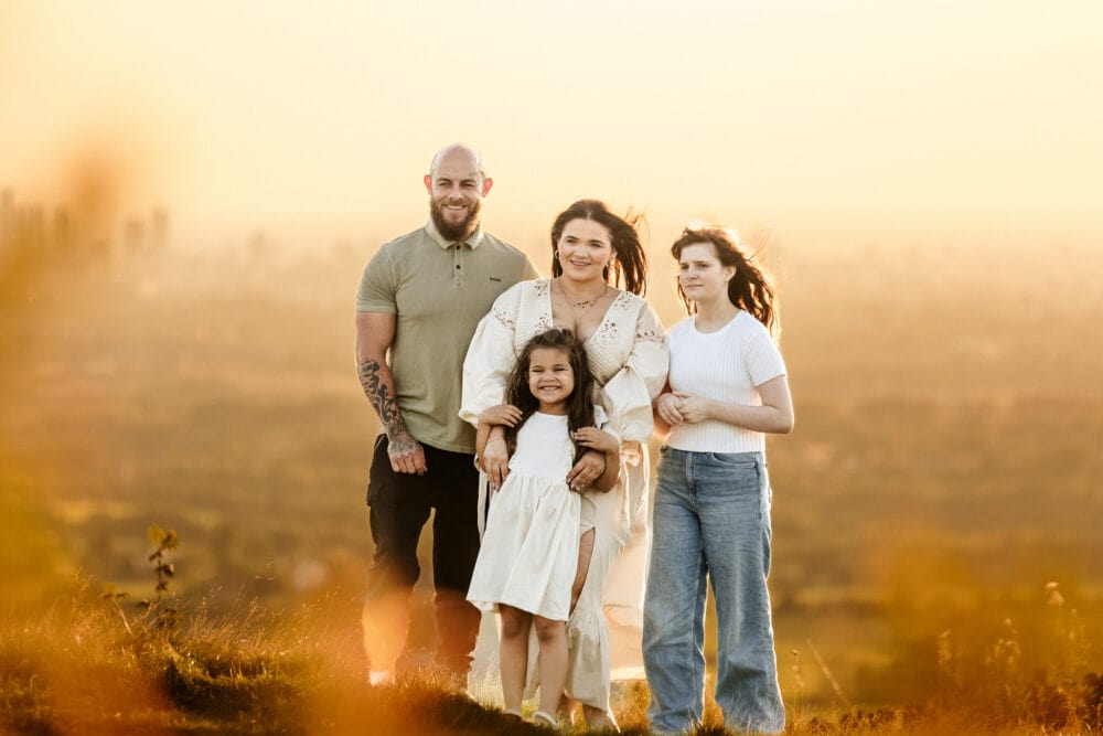 Family photoshoot at sunset at hartshead pike manchester by er photography award winning family photographers in manchester