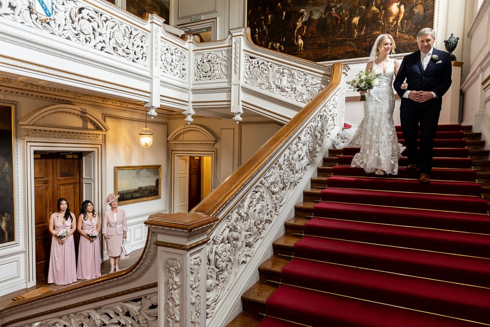 bride on the staircase at knowsley hall