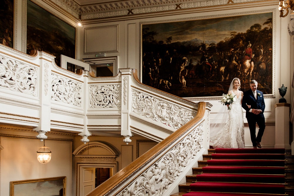 bride on the staircase at knowsley hall