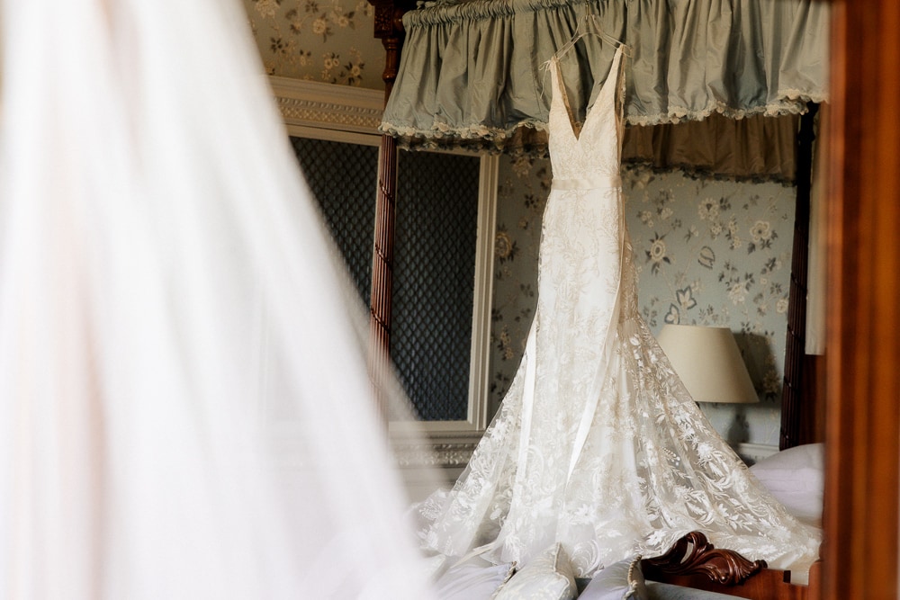 wedding dress in the bedroom at knowsley hall