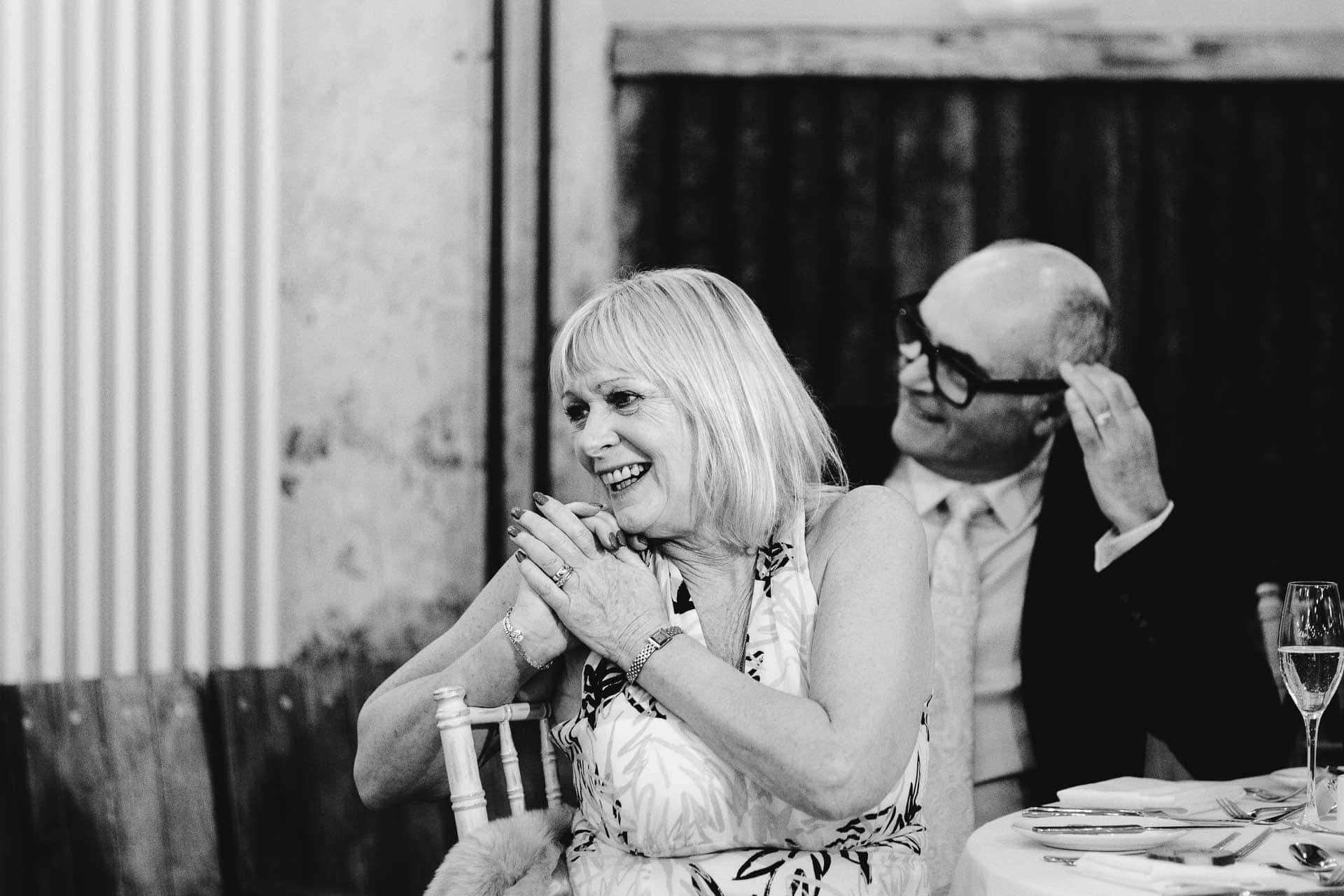 confetti with bride and groom at holmes mill