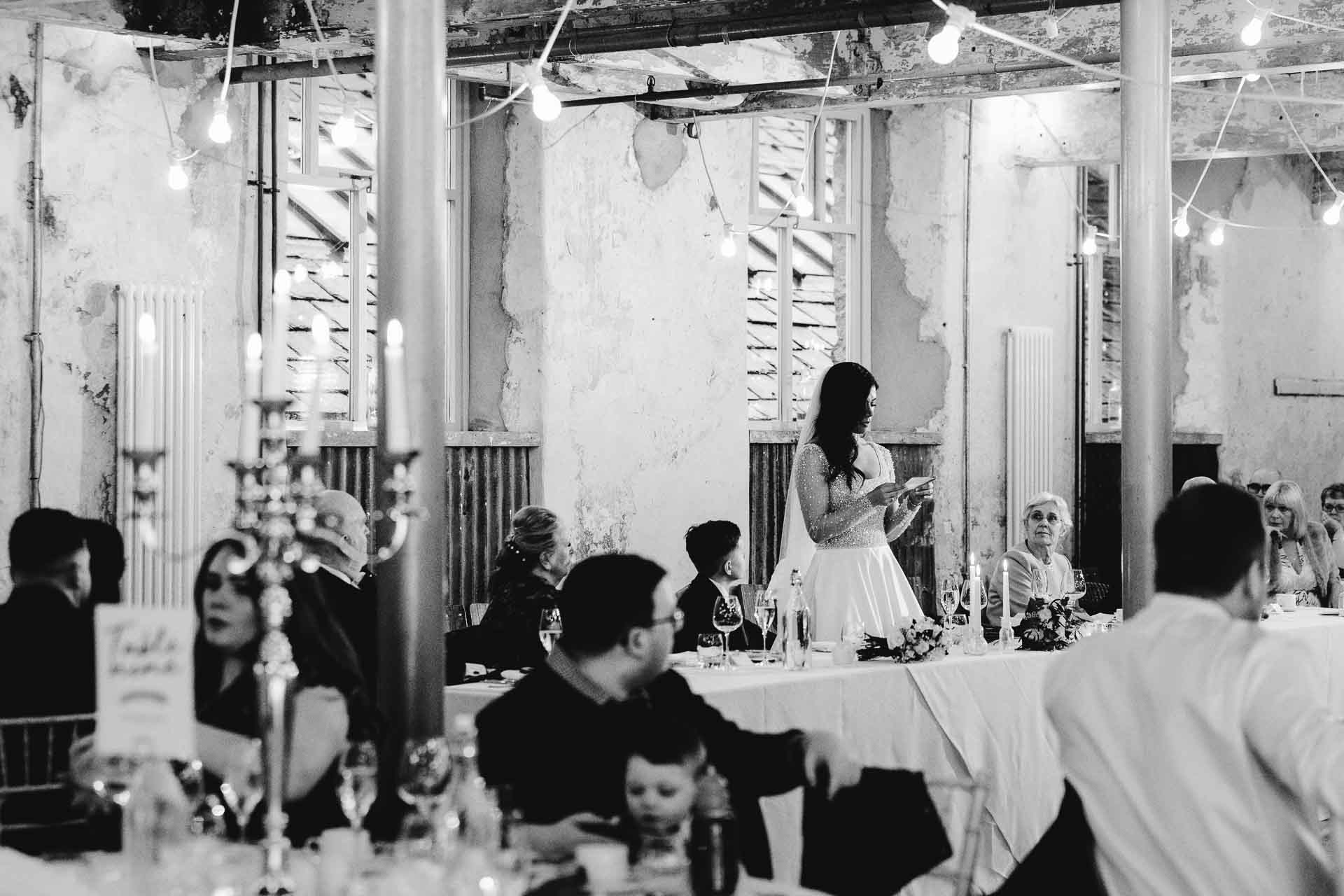 confetti with bride and groom at holmes mill