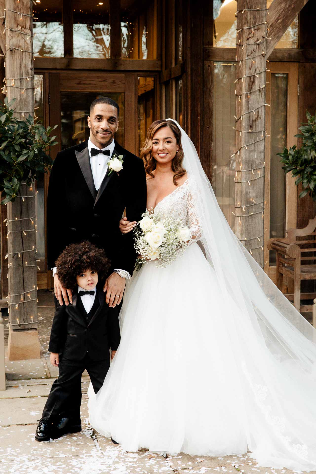 bride and groom portraits at the oak tree peover in the snow winter wedding