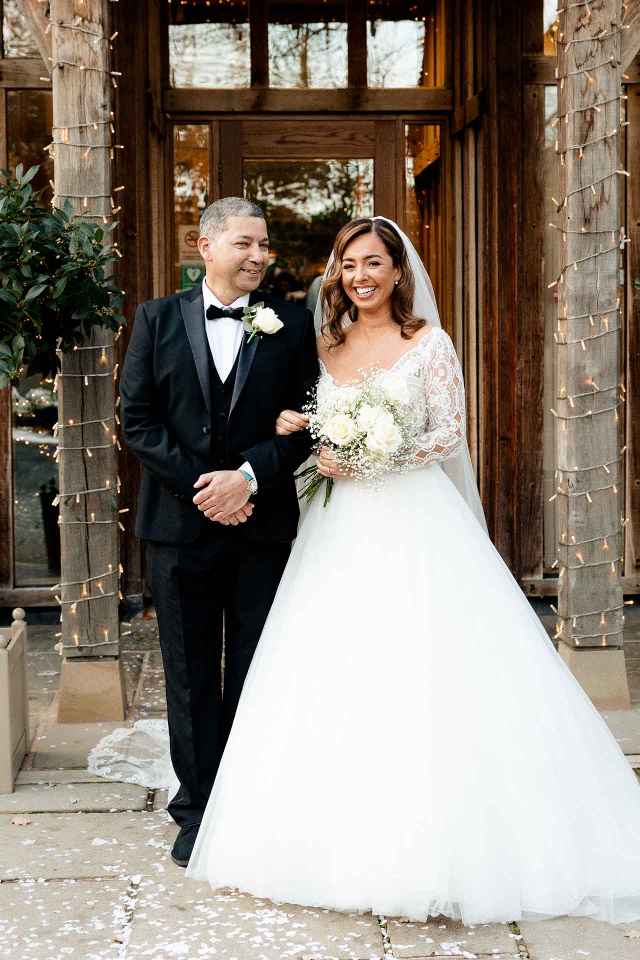 bride and groom portraits at the oak tree peover in the snow winter wedding