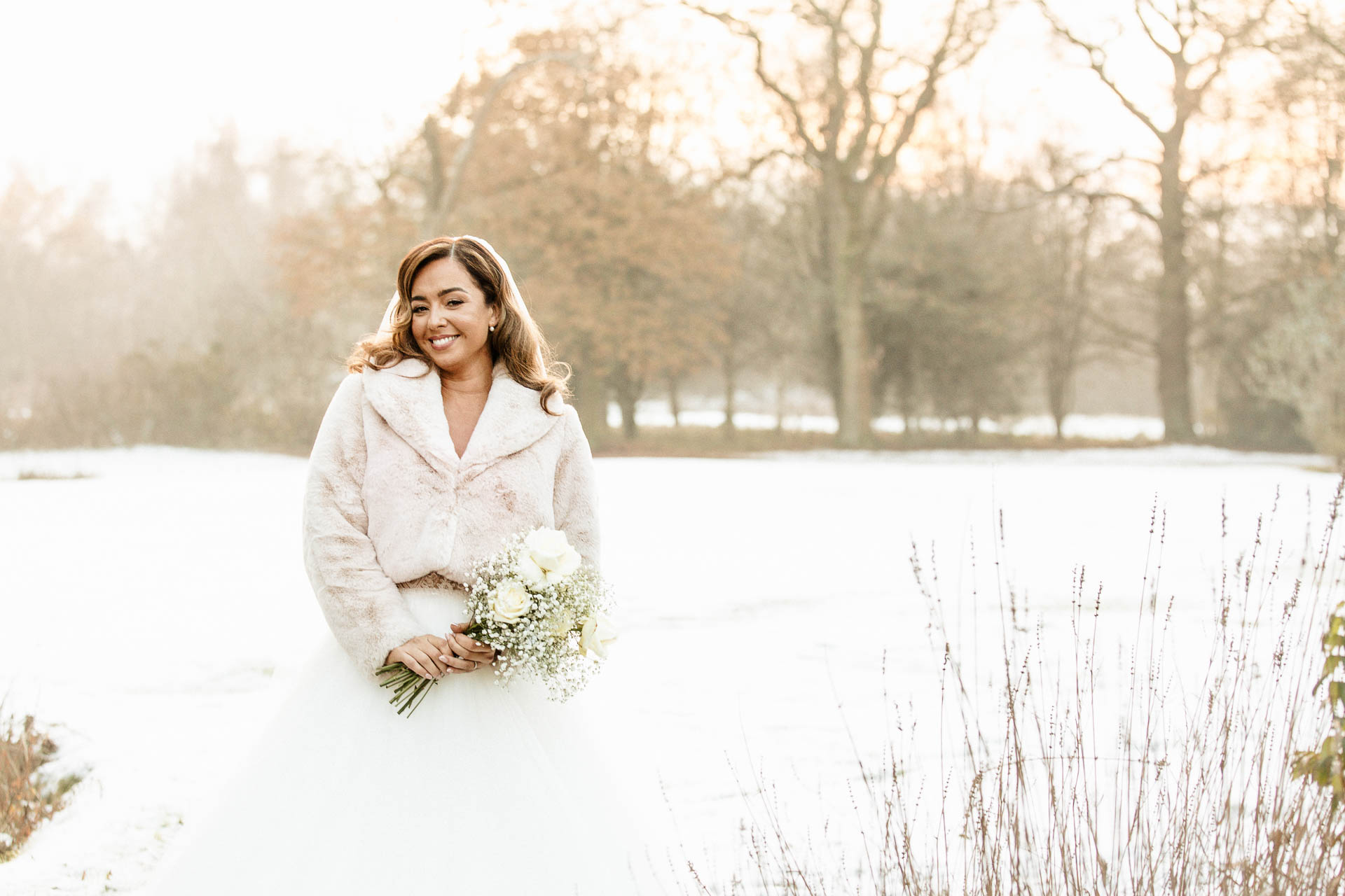 bride and groom portraits at the oak tree peover in the snow winter wedding