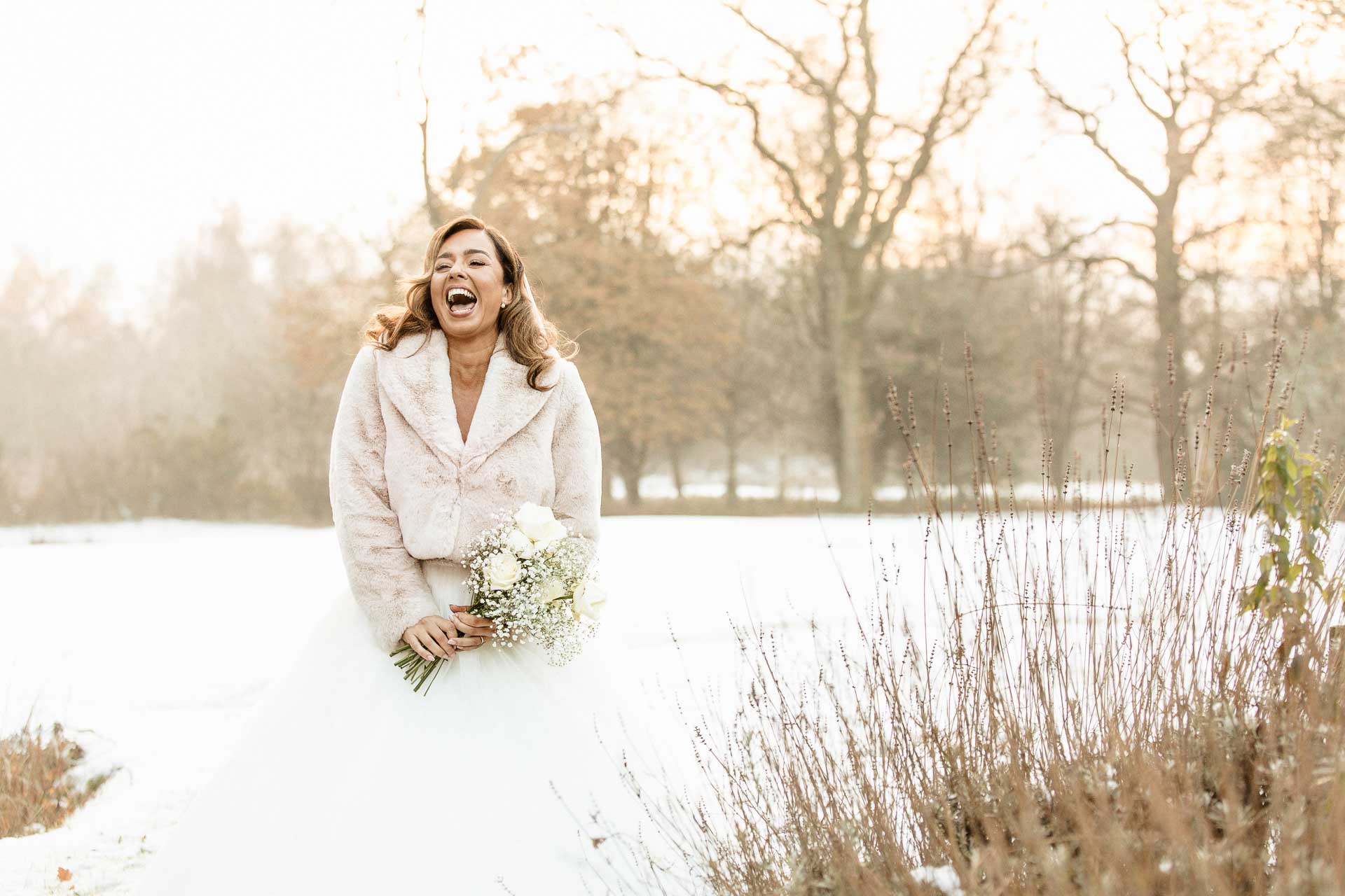 bride and groom portraits at the oak tree peover in the snow winter wedding