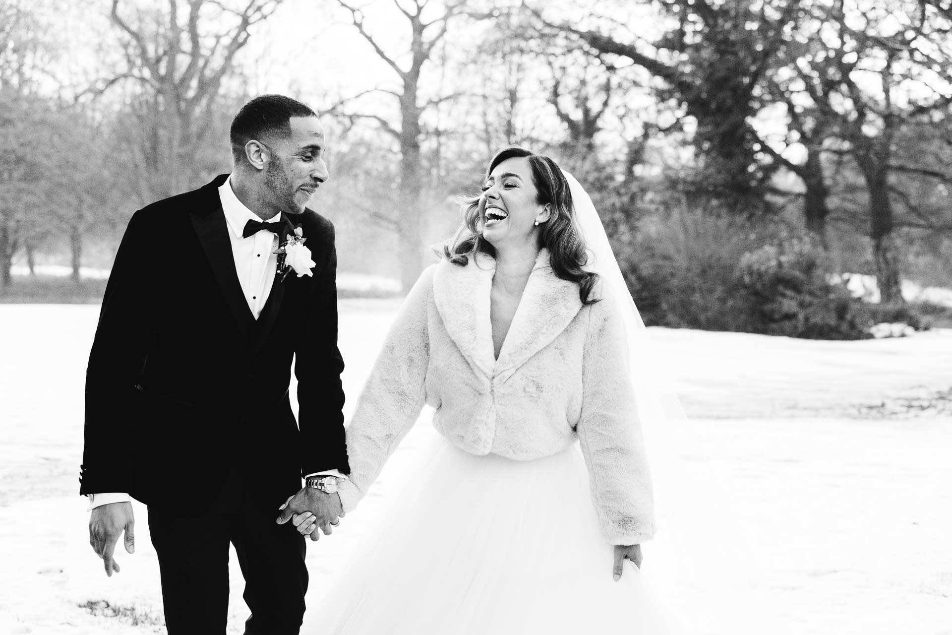 bride and groom portraits at the oak tree peover in the snow winter wedding