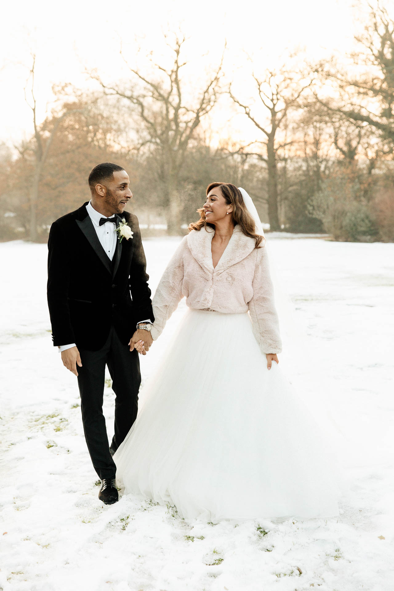bride and groom portraits at the oak tree peover in the snow winter wedding