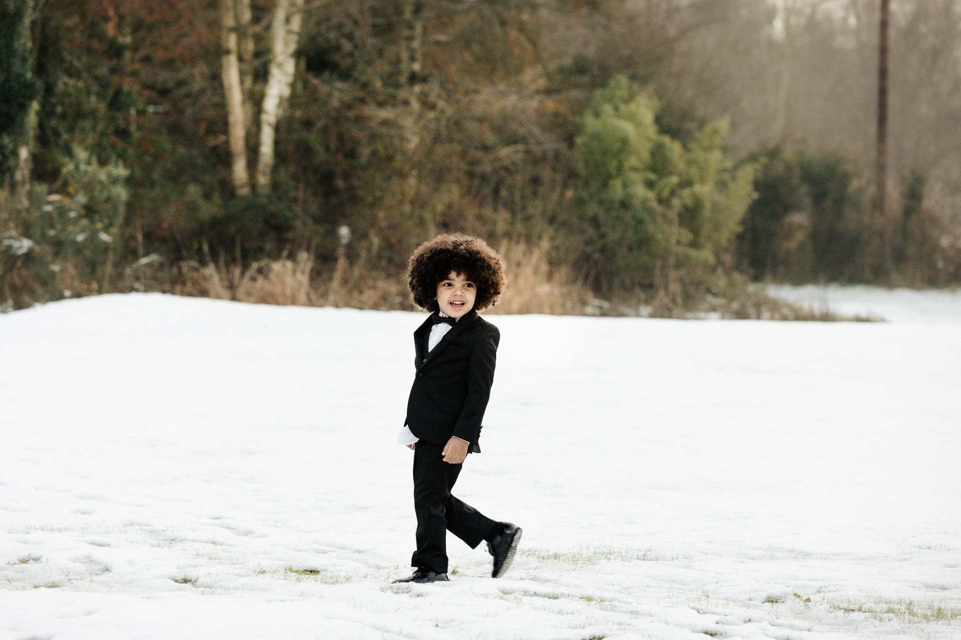 bride and groom portraits at the oak tree peover in the snow winter wedding