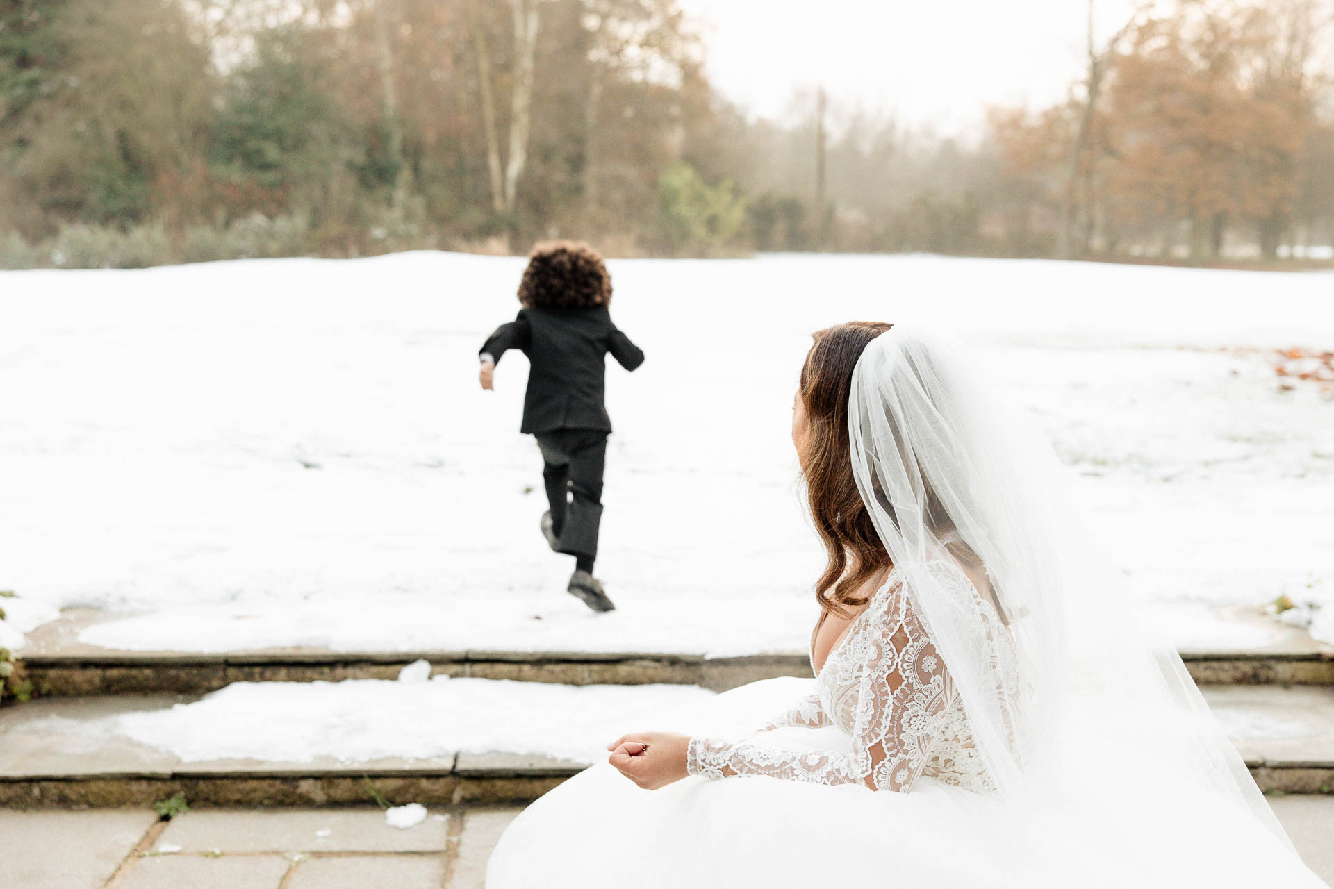 bride and groom portraits at the oak tree peover in the snow winter wedding
