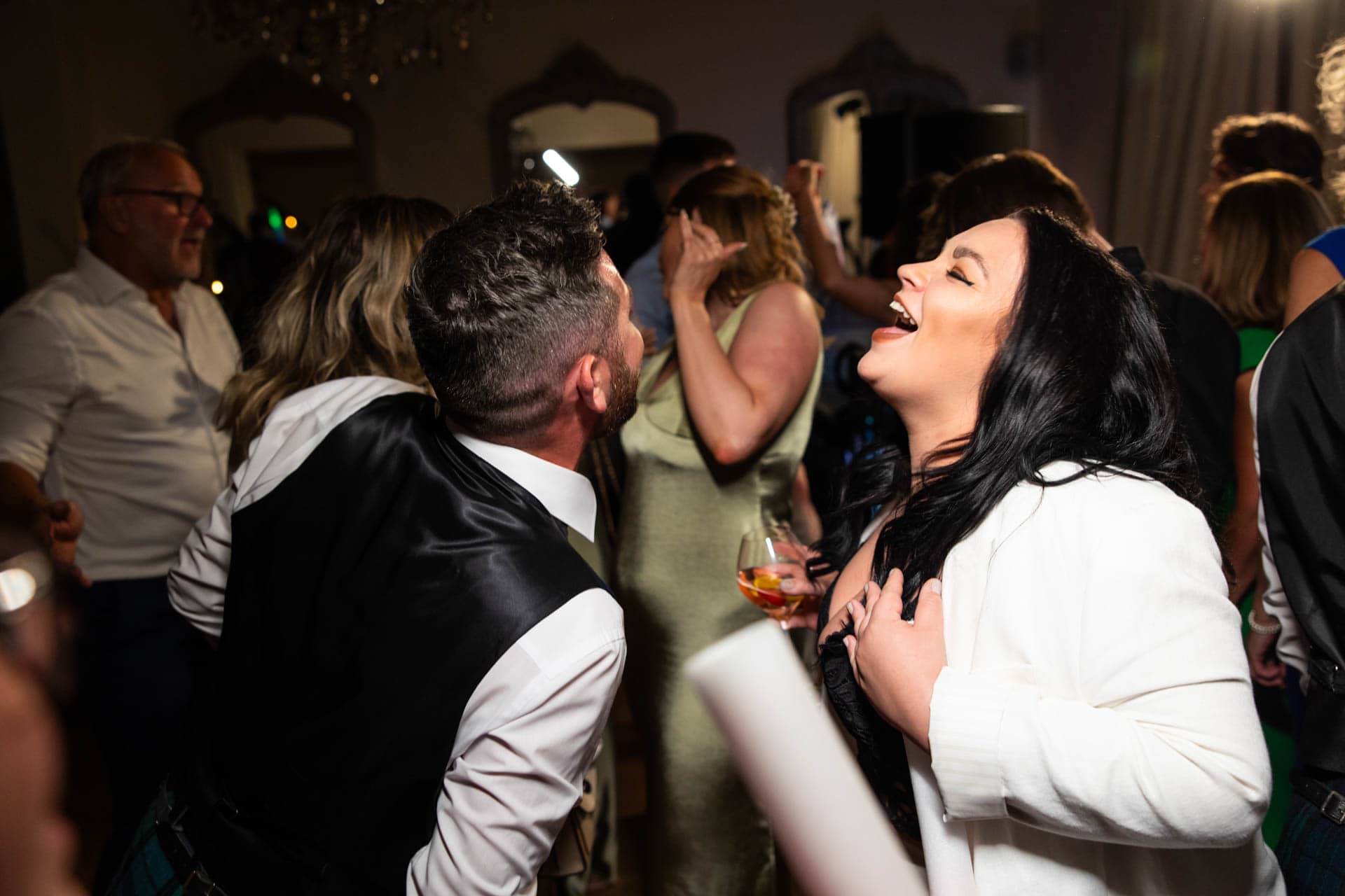 evening wedding reception photography at eaves hall
