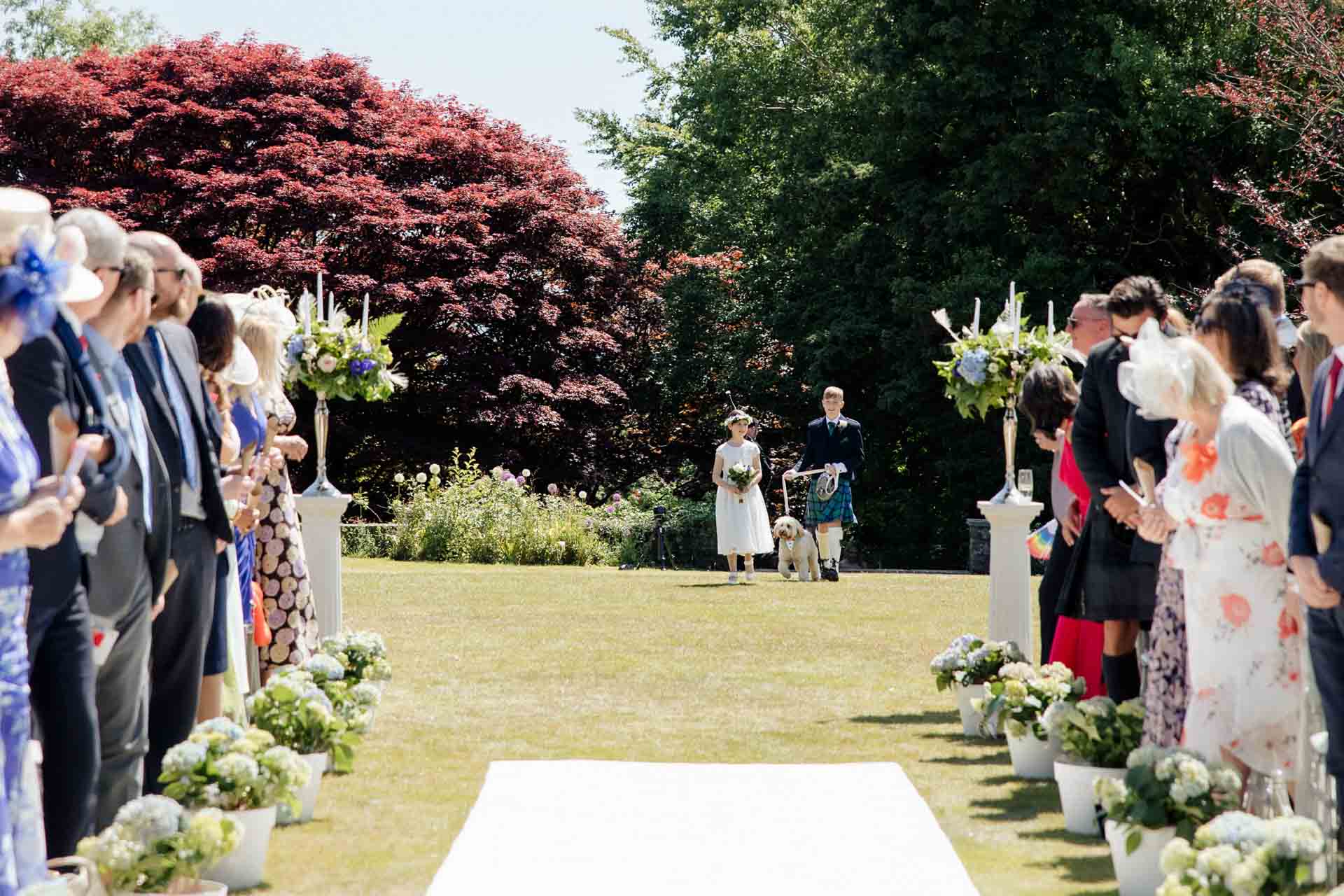outdoor ceremony vibes at eaves hall the outdoor space is stunning for an outdoor wedding