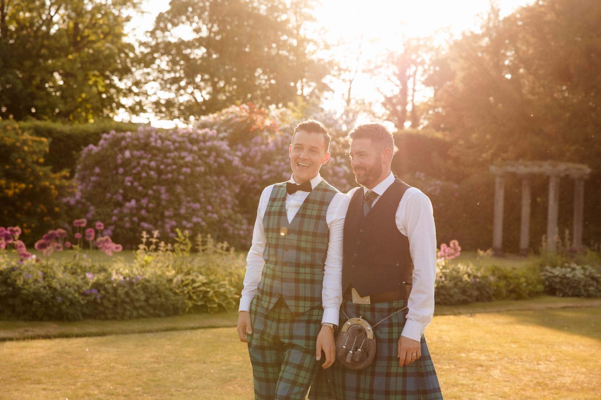 colourful smoke bombs used at eaves hall for the couples wedding photography