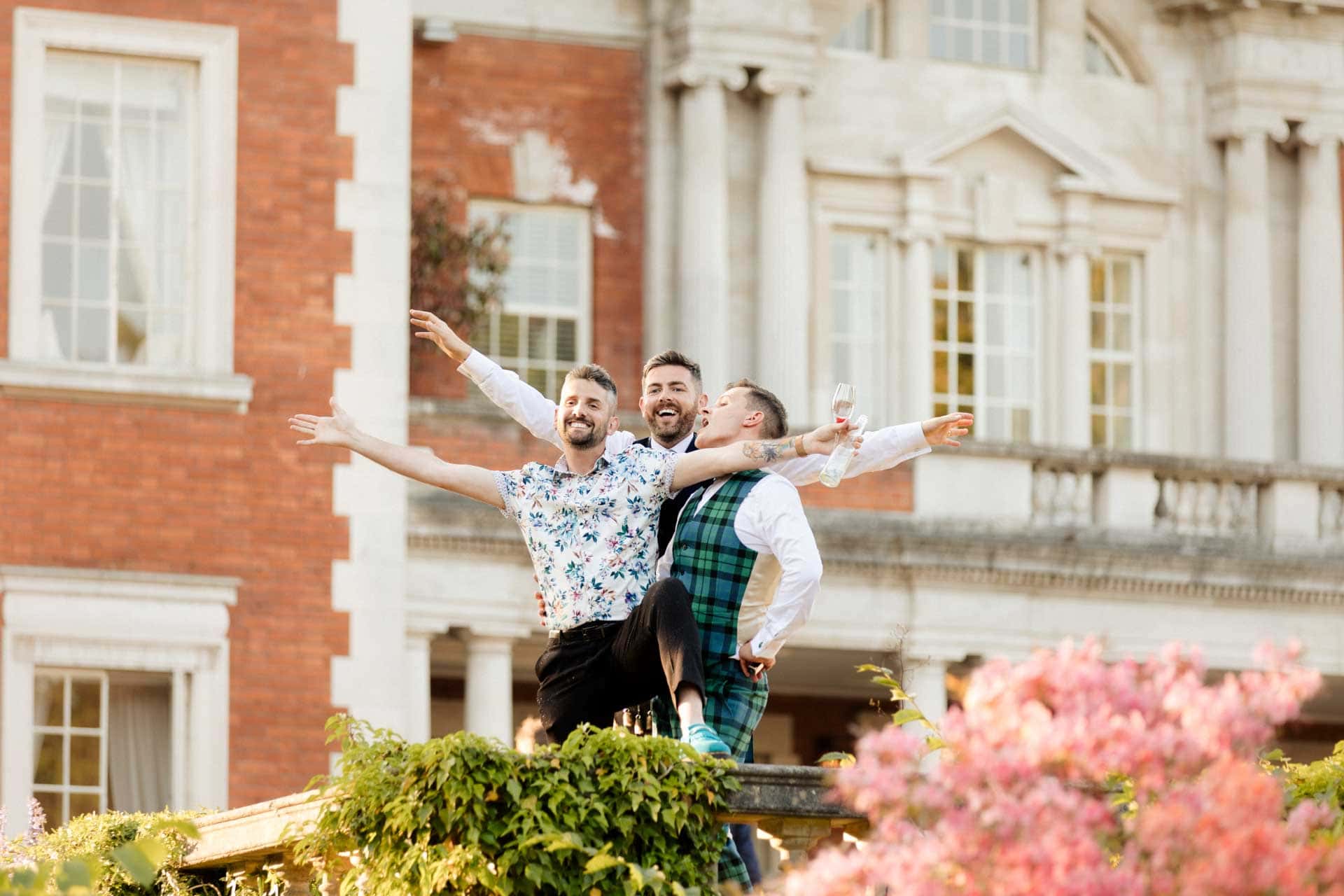 colourful smoke bombs used at eaves hall for the couples wedding photography
